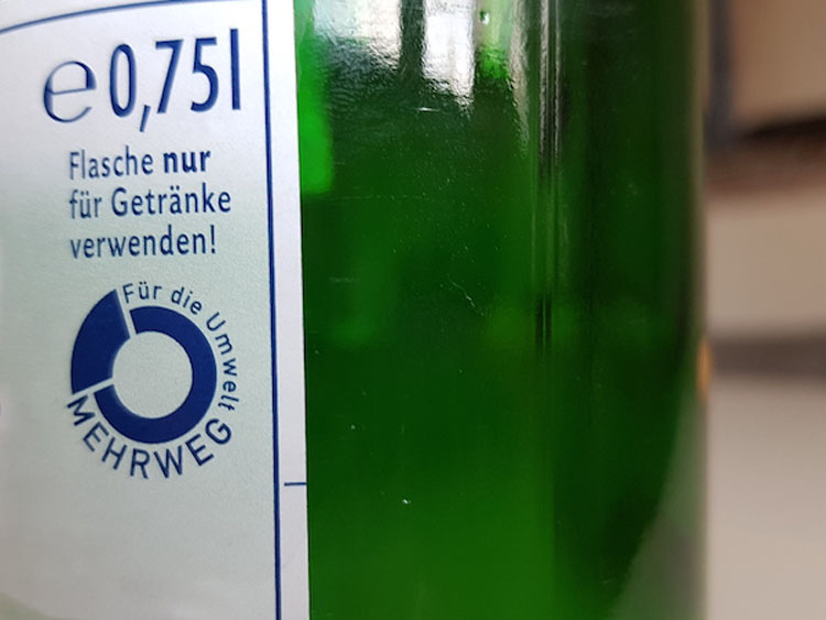 Auf diesem Etikett ist das Symbol für Mehrwegflaschen aufgedruckt. 